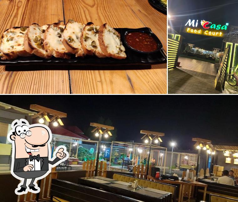 The image of exterior and food at Mi Casa Food Court