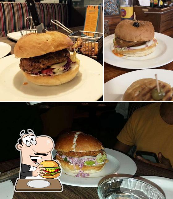 Try out a burger at Cafe Delhi Heights
