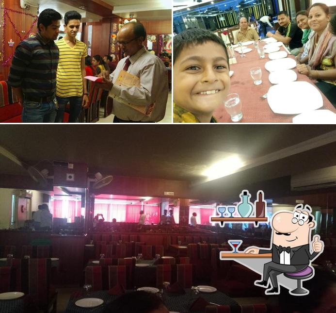 Take a seat at one of the tables at Dawat Restaurant