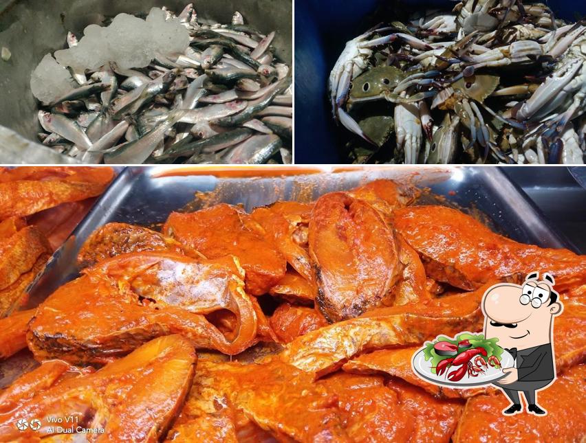 Get seafood at Fish Shop
