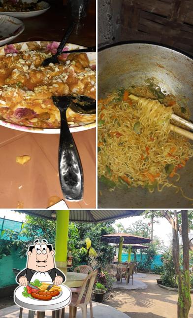 Take a look at the photo showing food and interior at Suhana Restaurant