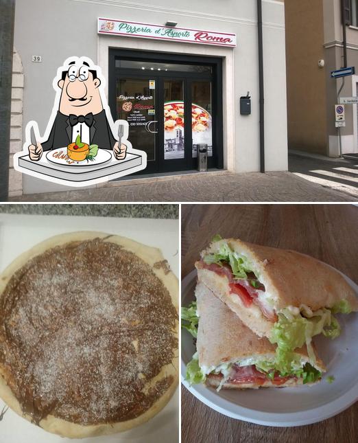 Tra le diverse cose da Pizzeria Roma si possono trovare la cibo e esterno