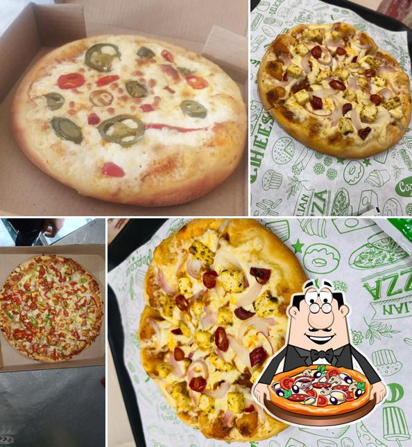 Try out pizza at Aromatic cafe