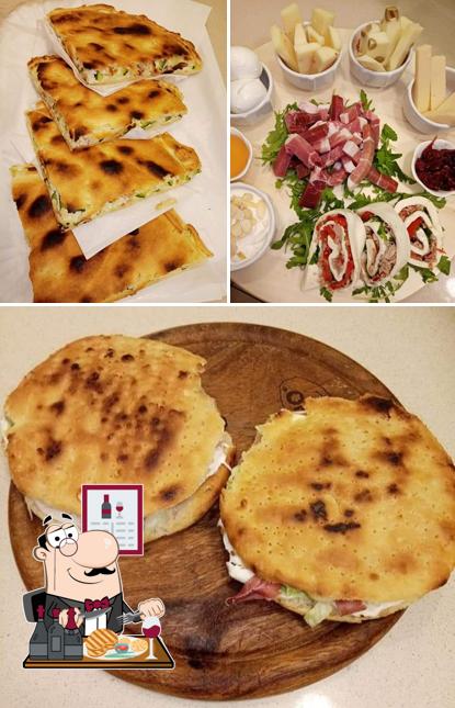 Ordina i un pasto a base di carne a PIZZERIA - GASTRONOMIA - ROSTICCERIA AL PORTO