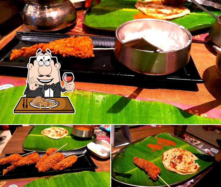 Order pizza at Dindigul Thalappakatti Restaurant