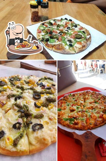 Get pizza at Happy Sandwich ( Pizza Factory)