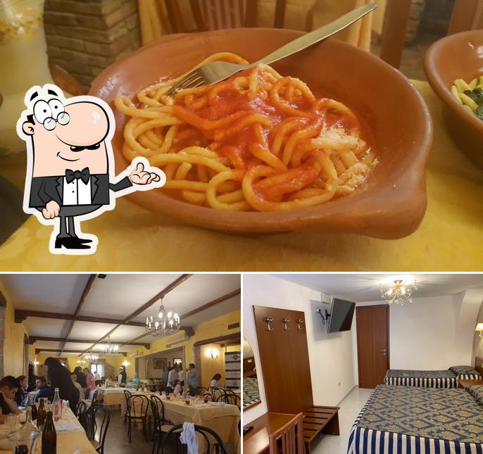 Questa è la immagine che presenta la interni e cibo di La Balconata Ristorante - Pizzeria - Hotel diffusion