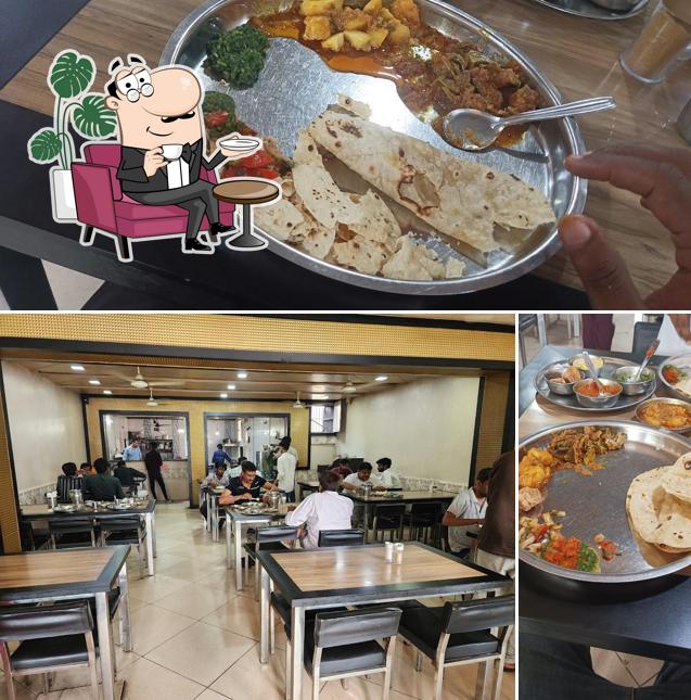The photo of interior and food at Manohar Parotha House