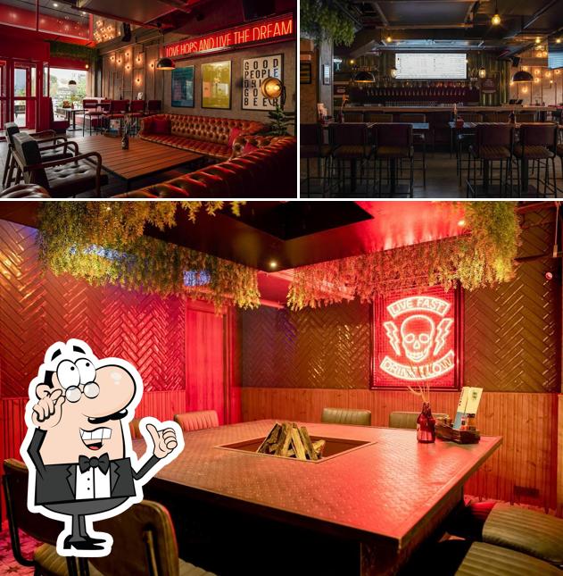Take a seat at one of the tables at BrewDog Amritsar