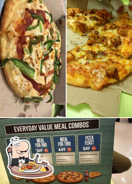 Try out pizza at Domino's Pizza Binanagar, Valsad
