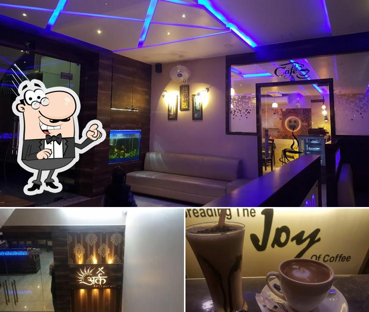 The photo of interior and beverage at Ark Restaurant and Cafe