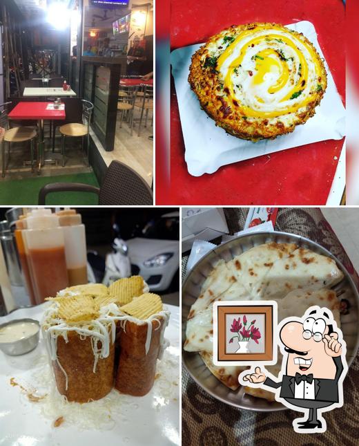 Take a seat at one of the tables at Preeti Sandwich and juice