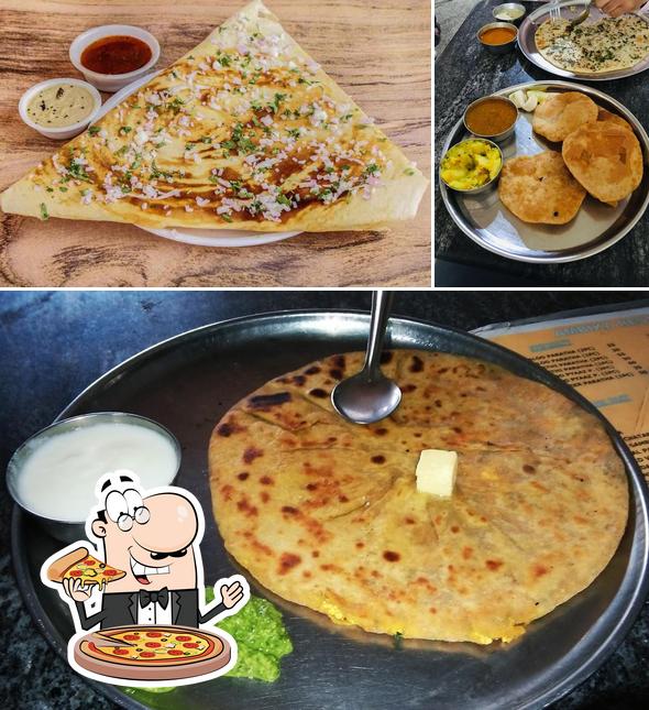 Pick pizza at Ambika restaurant