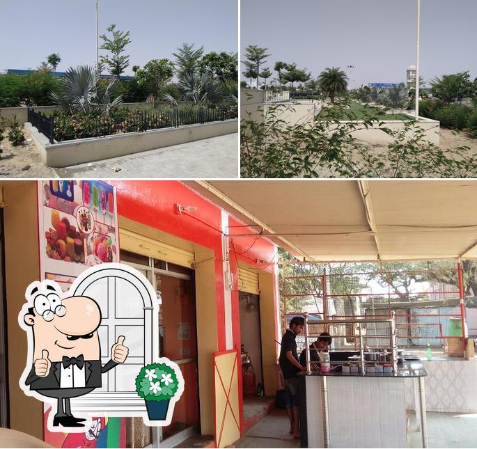 Check out the photo displaying exterior and interior at Manoj Restaurant