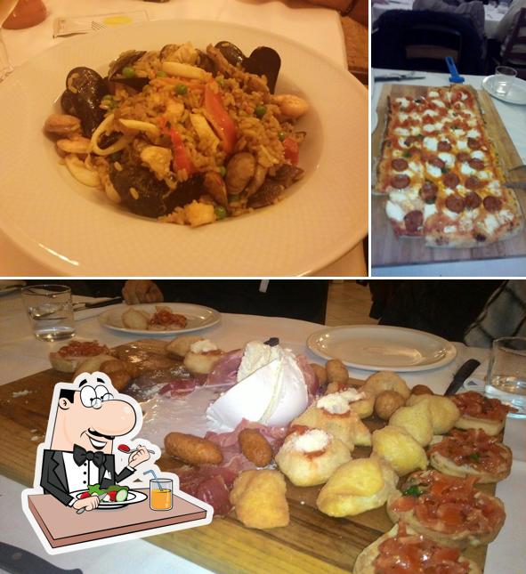 La foto della cibo e tavolo da pranzo di Pizzeria Zio Nunzio