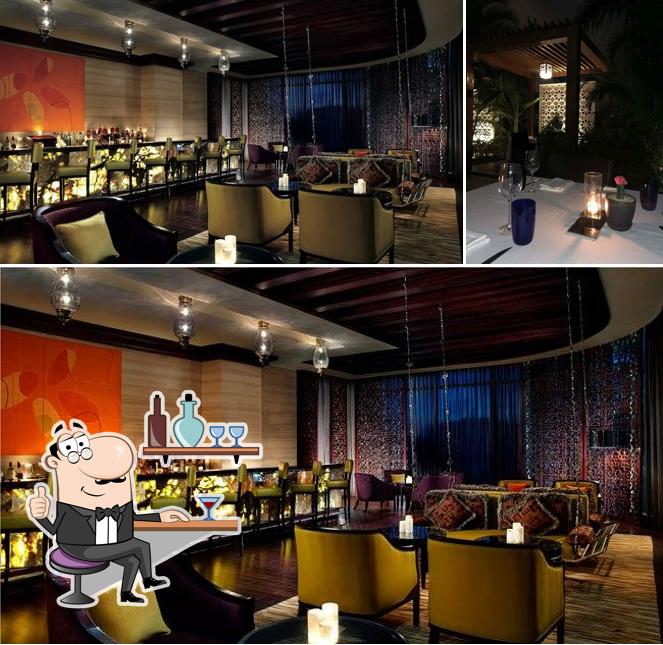 The Ritz-Carlton Bar is distinguished by interior and dining table