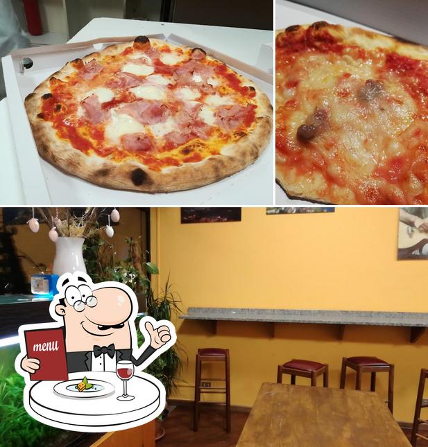 Dai un’occhiata alla foto che presenta la cibo e interni di Pizzeria CRISTALLO