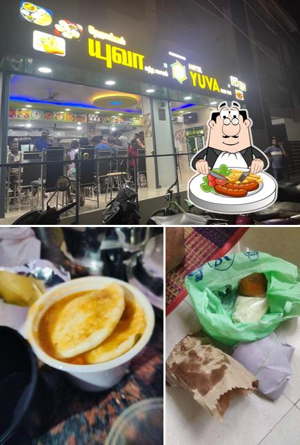 The photo of Yuva Tiffen Center Restaurant’s food and exterior