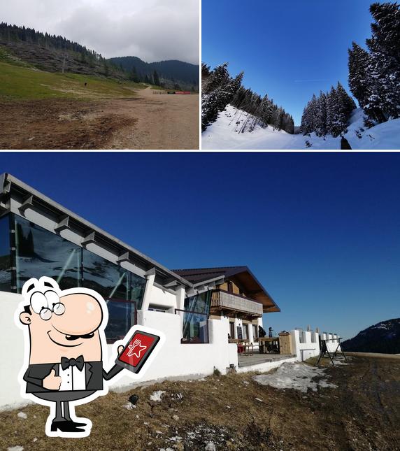 Goditi la vista dagli esterni di Baita Melette Sport & Gourmet