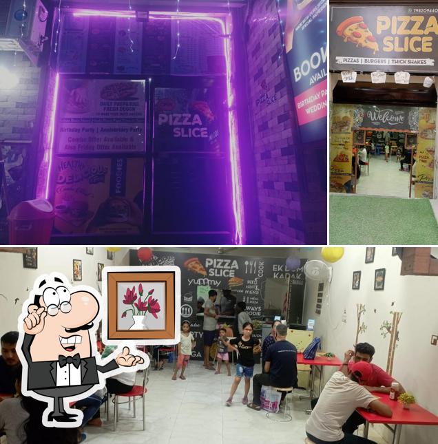 The interior of PIZZA SLICE