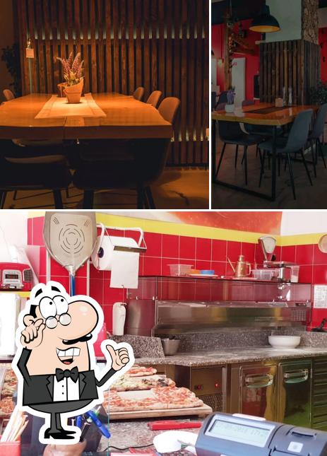 Dai un'occhiata agli interni di Pizzeria La Rossa