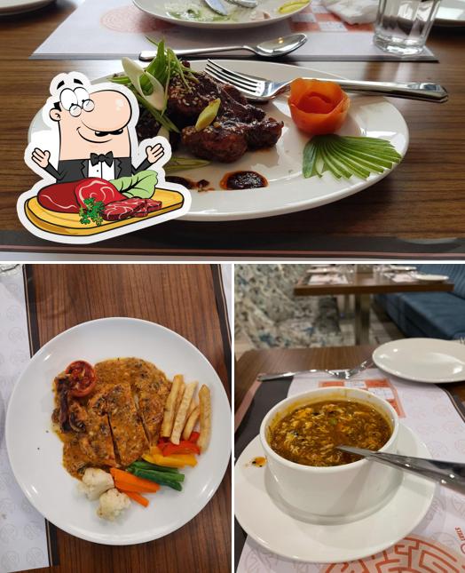 Get meat dishes at Hotel Kottayam Grand