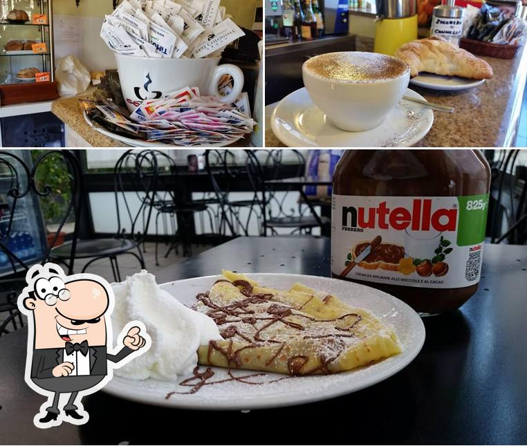 Questa è la foto che mostra la interni e cibo di Gilda Caffè