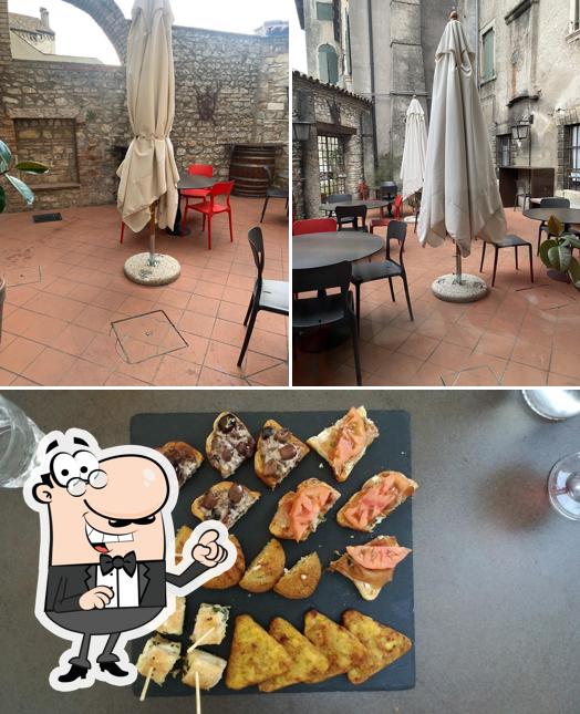 Questa è la foto che presenta la interni e cibo di Il Ventennale