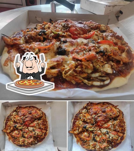 Try out pizza at Venus Restaurant