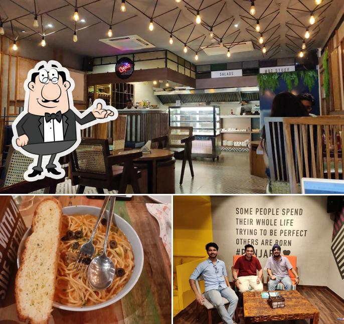 The image of interior and food at Corbu's Cafe