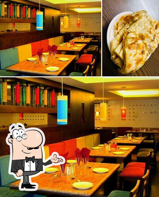 The photo of interior and food at Dish Restaurant
