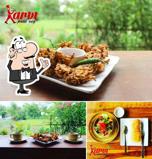 Among various things one can find interior and beverage at Karvi Pure Veg