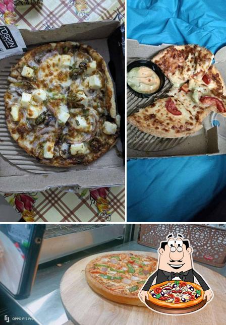 At Tossin Pizza Sector 76 Noida, you can try pizza