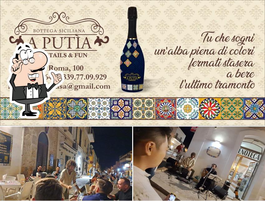 La immagine della interni e vino di A Putìa
