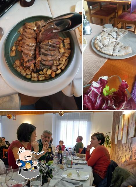 Questa è la foto che presenta la cibo e interni di Hotel PIzzeria Dovina