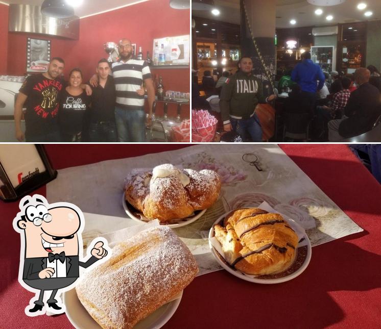Tra le varie cose da Bar Caffe' Touring si possono trovare la interni e dolce