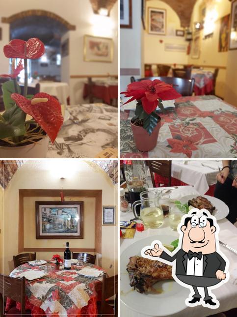 Siediti a un tavolo di Ristorante Pizzeria L'Arco