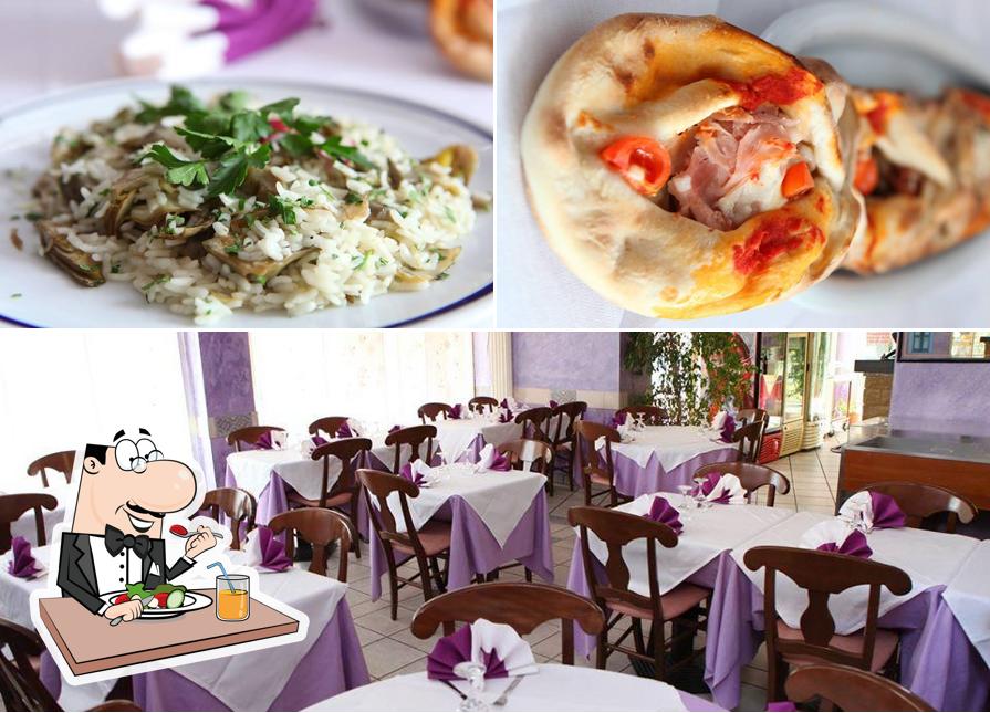 Dai un’occhiata alla immagine che presenta la cibo e interni di Pizzeria Le Betulle