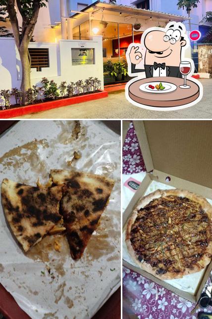 This is the picture depicting food and interior at Pizza Mechanics