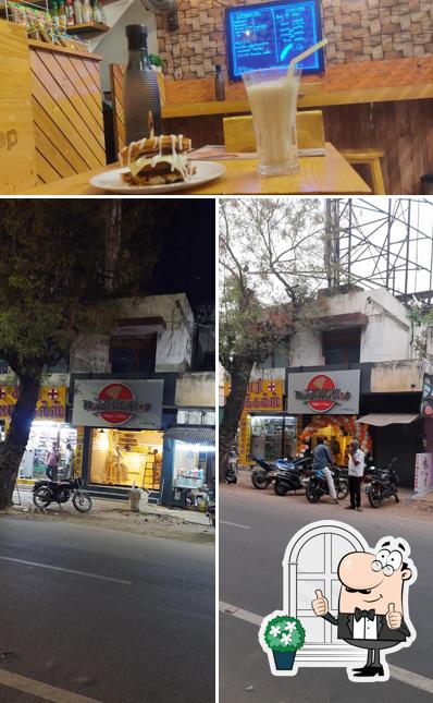 The photo of exterior and food at THE WAFFLE STOP