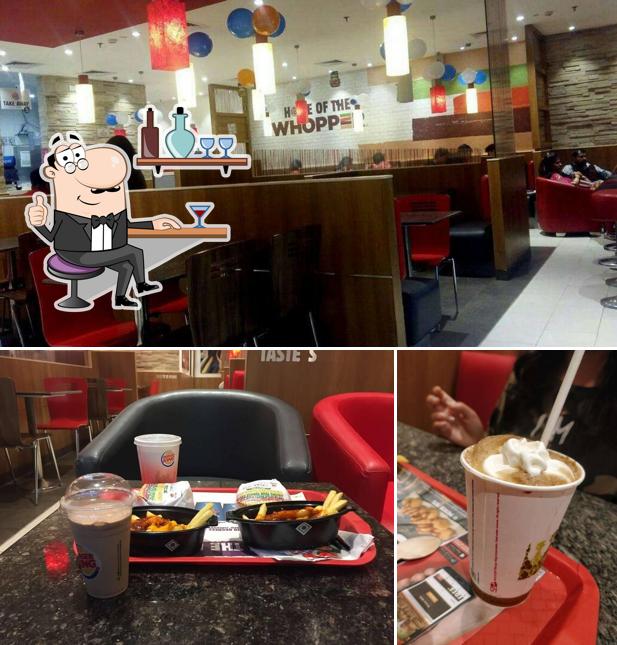 Take a look at the photo depicting interior and drink at Burger King