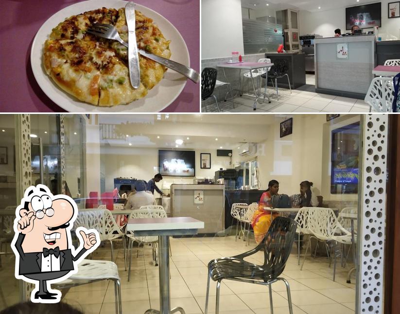 This is the image depicting interior and food at Eden Garden
