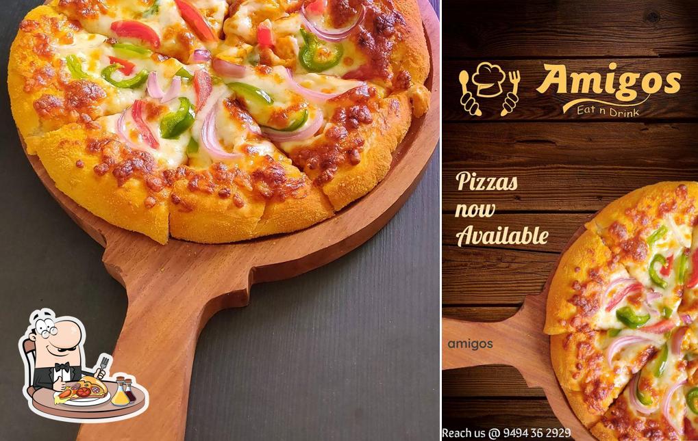 Try out pizza at Amigos Eat n Drink