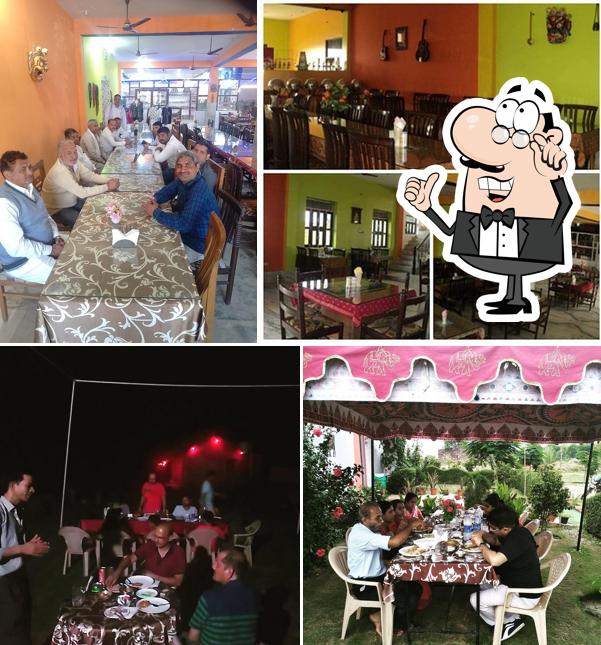 Take a seat at one of the tables at GANGAUR MIDWAY