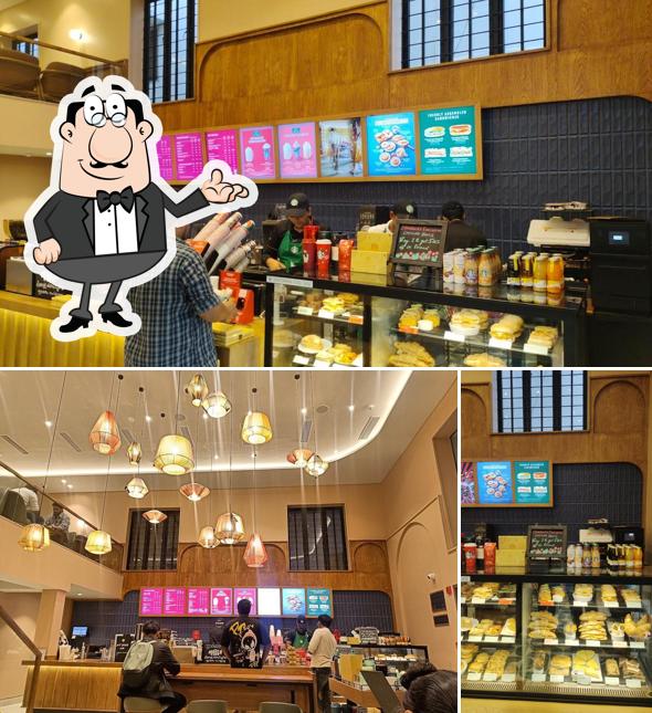 Take a seat at one of the tables at Starbucks