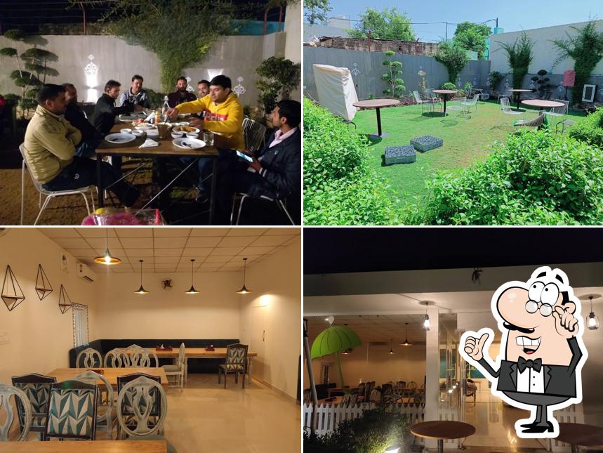Take a seat at one of the tables at Green Umbrella