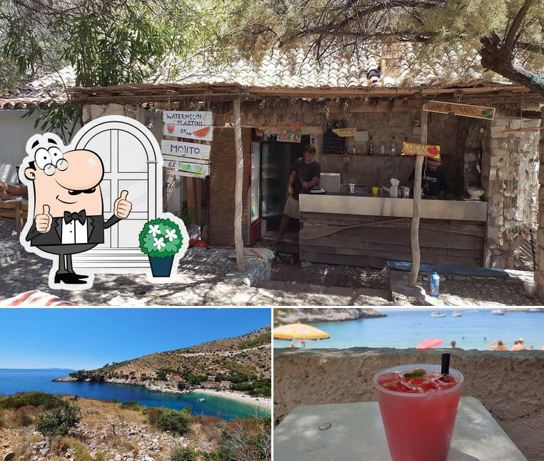 Guarda la foto che raffigura la esterno e alcol di Duba Beach Bar