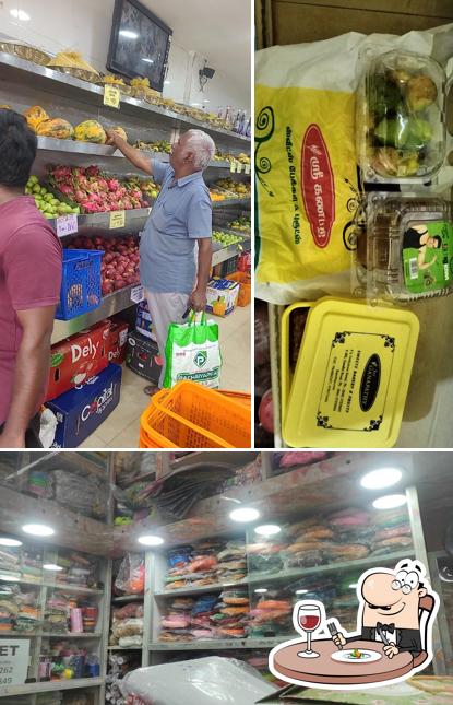 The photo of Sri Ganapathy Sweets, Bakery & Fruits’s food and interior