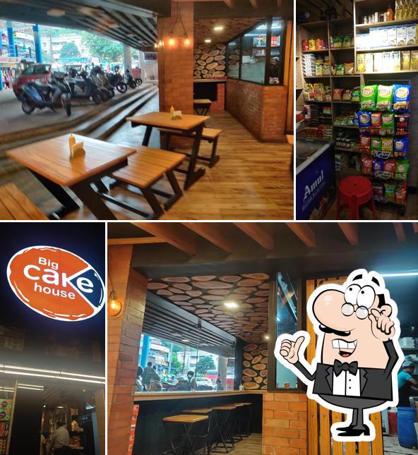 Take a seat at one of the tables at Big Cake House