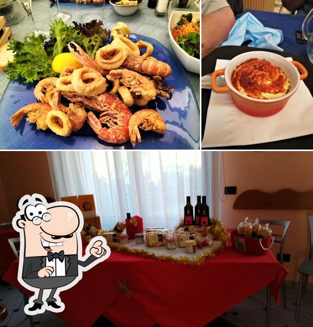Siediti a un tavolo di Ristorante Pizzeria Il Cigno